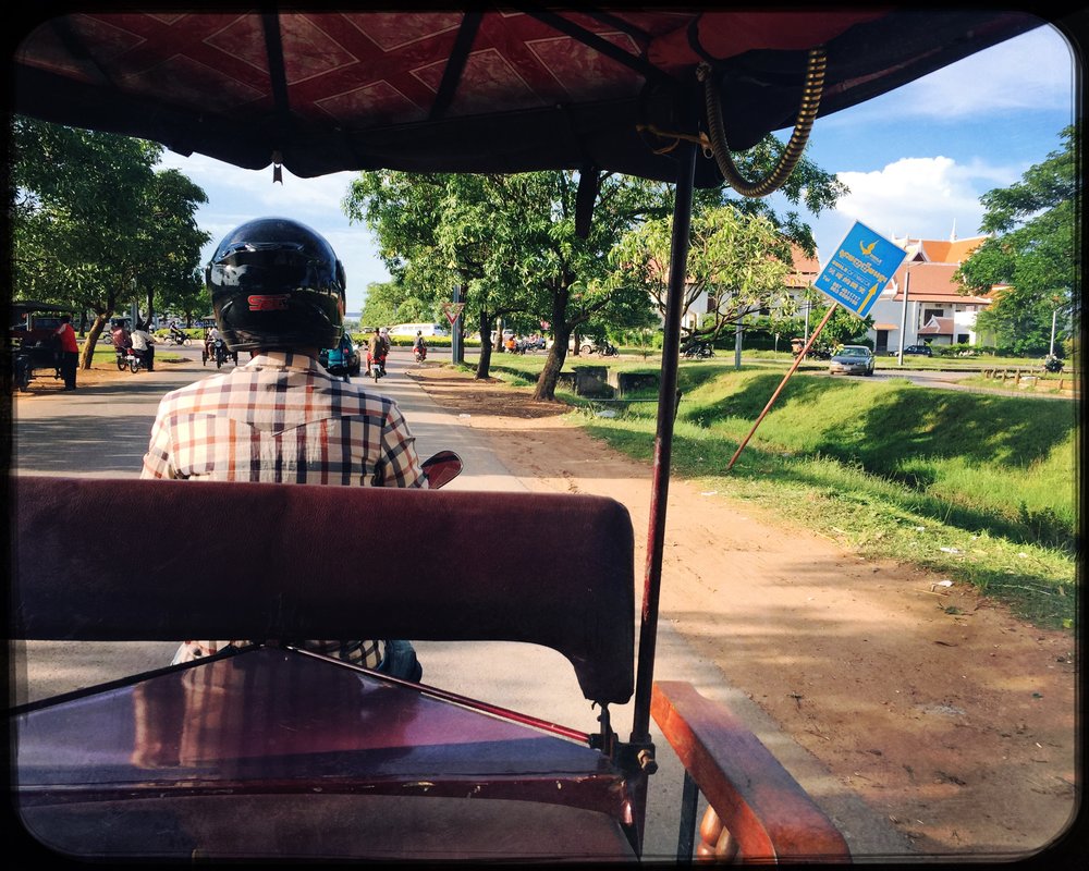 Tuk Tuk through the countryside on the way to Angkor Wat.
